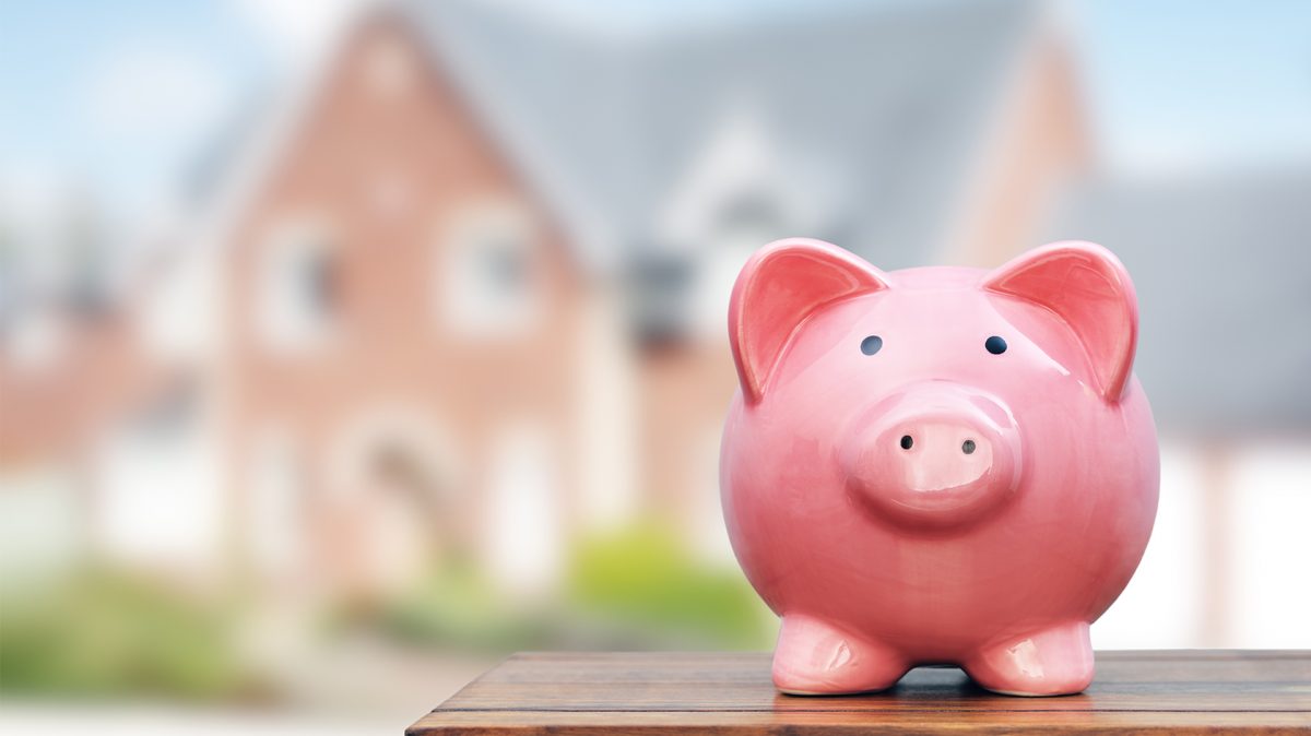 a piggy bank to save for a downpayment on a house