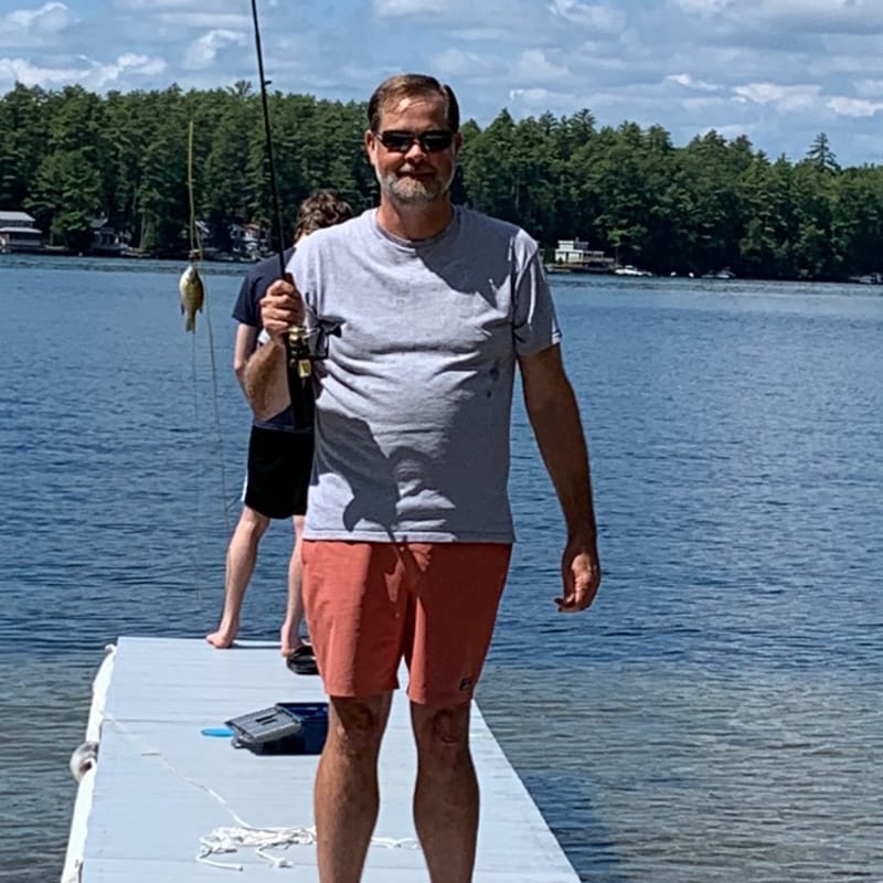 Tom Zuke fishing at a lake