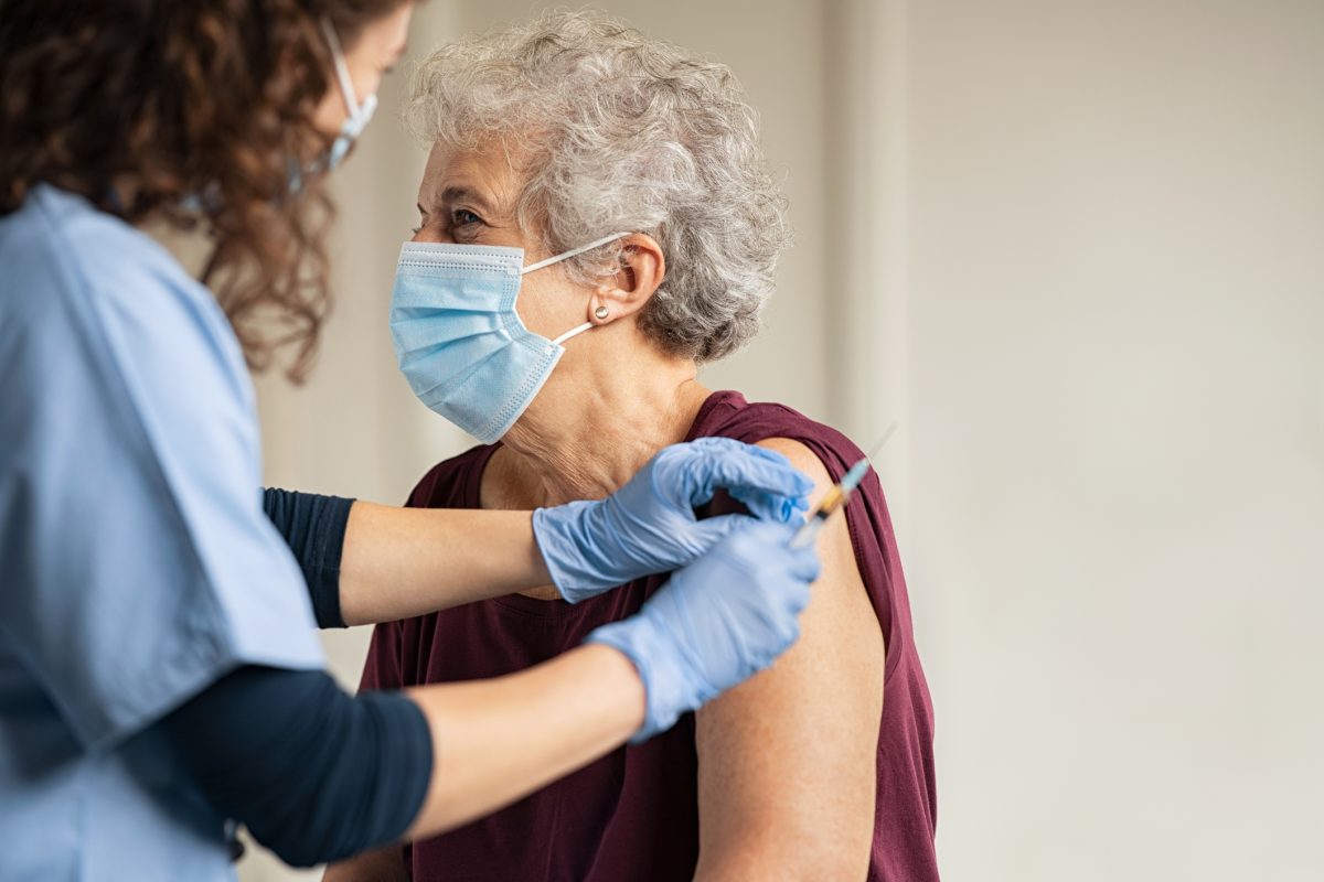 woman getting covid vaccine